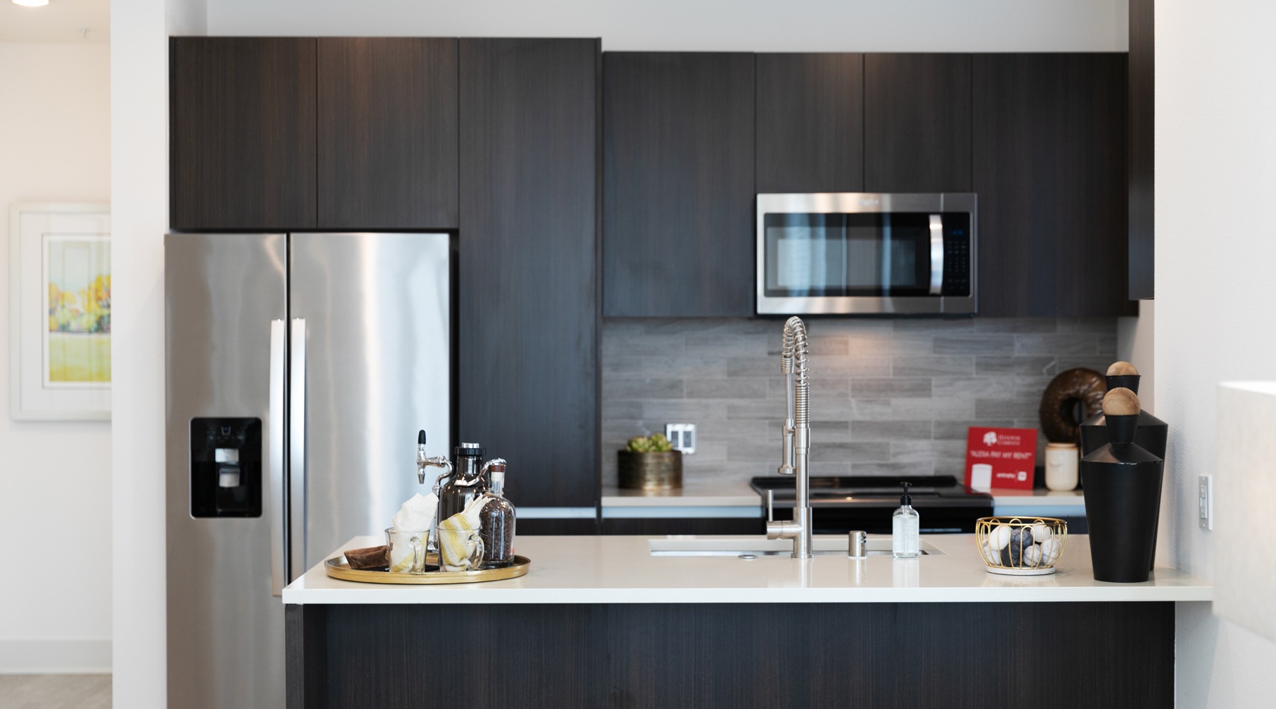 kitchen with large countertop and stainless steel appliances
